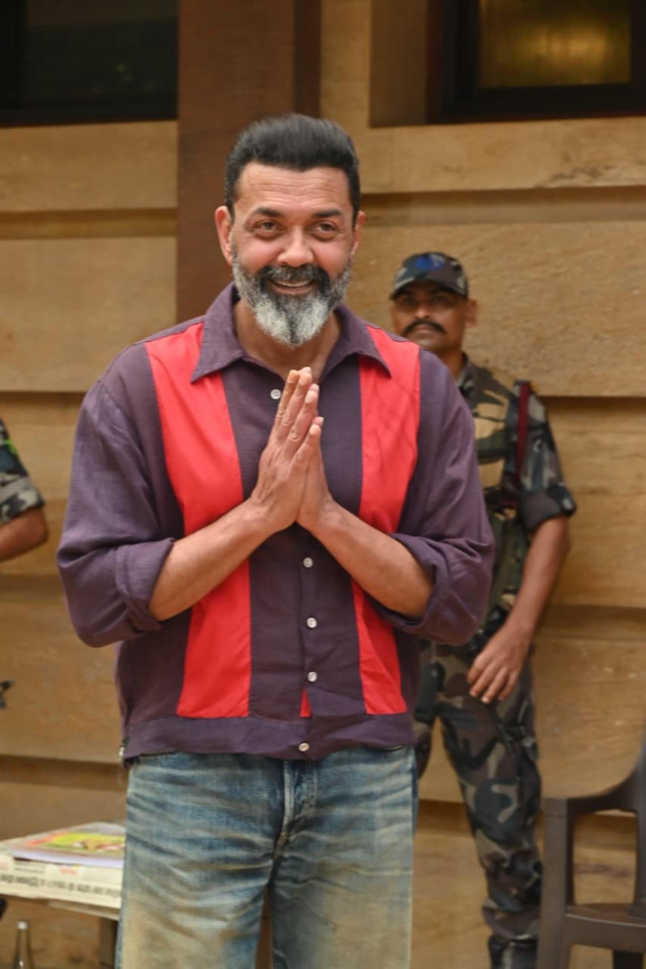 Bobby Deol, who celebrated his 30 years in the industry today, was seen greeting the paps and his fans with folded hands as they gathered to meet him.